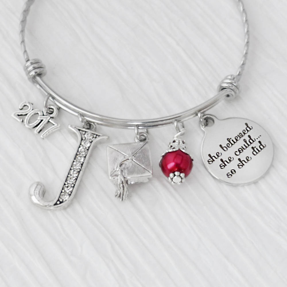 Personalized she believed she could so she did bangle bracelet with rhinestone letter and graduation cap charm. custom year charm with red bead