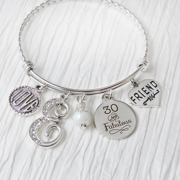 30 and fabulous custom bangle bracelet with initial letter, love charm and heart shaped friend charm with white bead. can be 40 and fabulous or 50 60