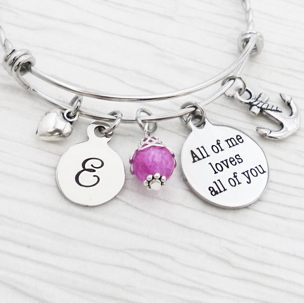 personalized bangle bracelet with round letter charm and all of me loves all of you charm with anchor charm and small heart charm and pink bead
