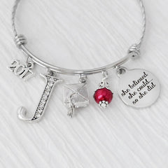 Personalized she believed she could so she did bangle bracelet with rhinestone letter and graduation cap charm. custom year charm with red bead 